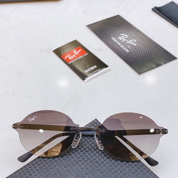 Ray-Ban 8060 gold titanium glasses